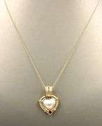 18kt Yellow gold heart shaped Mabe pearl and pear ruby and diamond accent enhancer pendant on chain
