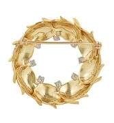 0.30ctw Diamond Leaf Circular Swirl Brooch in 18K