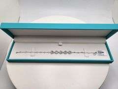 Charming 18kt White Gold Bracelet With Heart Shaped Diamond Accents