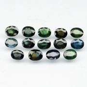 Nigerian material! 4.79ct blue green Sapphire set!