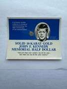 Two Solid 14 K Gold JFK Memorial Half Dollars.