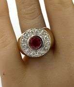 14kt Yellow gold 1.50ct ruby and 0.75ctw diamond halo ring