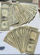 Thirty Two Assorted 1957 Series $1 Silver Certificates