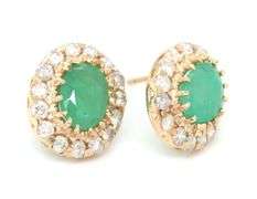 14kt Yellow gold oval emerald and diamond halo earrings