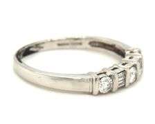 Platinum 0.25ctw round and baguette 5 stone diamond ring