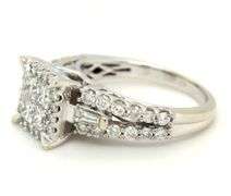 14kt White gold 1.25ctw Invisible set princess cut and round brilliant cut baguette ring