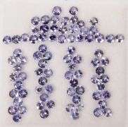 Untreated! Glittering 5.60ct round cut Tanzanite set!