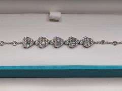 Charming 18kt White Gold Bracelet With Heart Shaped Diamond Accents