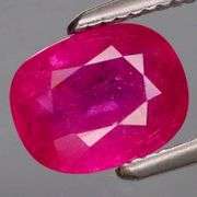 Wow! Fully translucent cushion cut 1.35ct Ruby center stone!