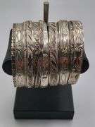 Great! Antique Russian silver, marked 84, quantity of 12 hand hammered antique silver bangles.