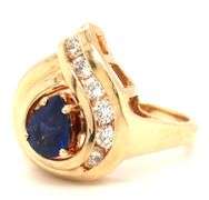 14kt Yellow gold 1.10ct sapphire and 0.50ctw diamond swirl ring