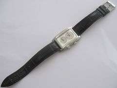 TIFFANY & CO. MEN'S DUAL TIME ZONE WATCH.