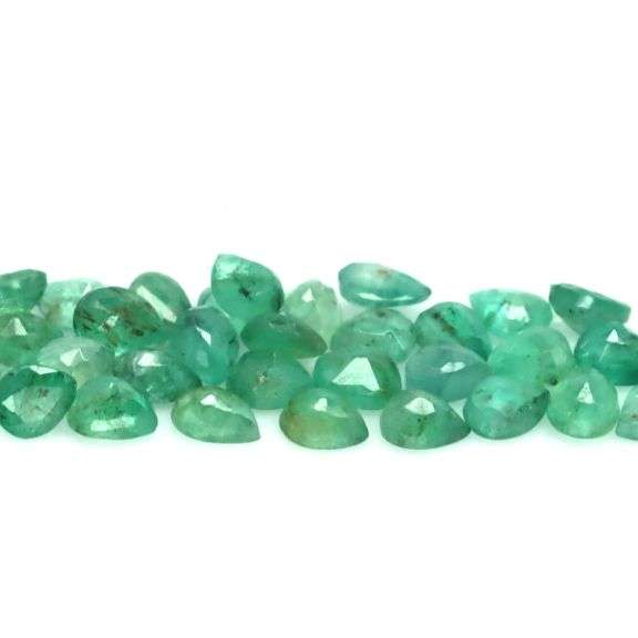 Bright emerald green 7.13ct 33pc Emerald set