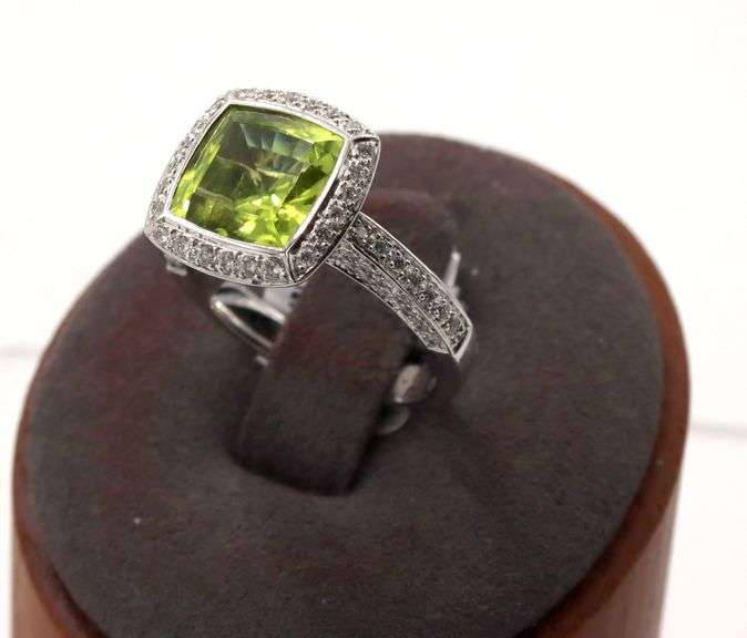 18kt White gold 3.14ct Peridot with 0.66ctw pave diamond halo and shank