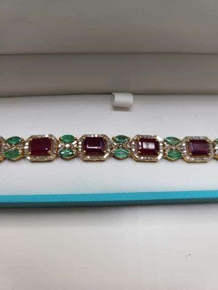 Very fine hand made 25 ctw ruby and 18 emeralds bracelet