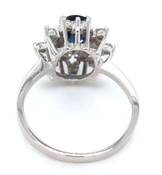 14kt White gold oval sapphire and single cut diamond cluster flower earrings