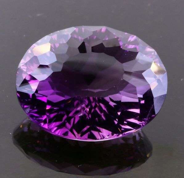Top tier 26.87ct concave cut Amethyst