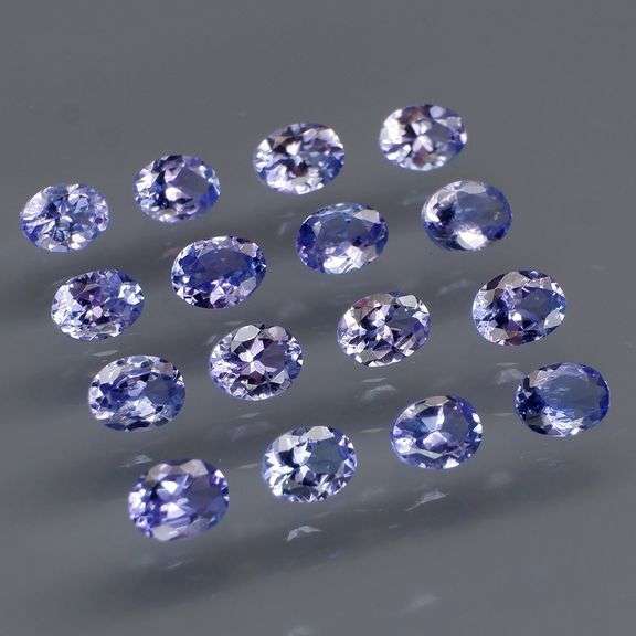 Heavy flashing! Untreated! 2.90ct oval cut Tanzanite set