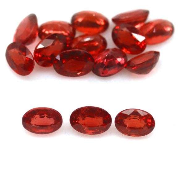 Amazing 9.85ct oval cut cherry red Garnet set