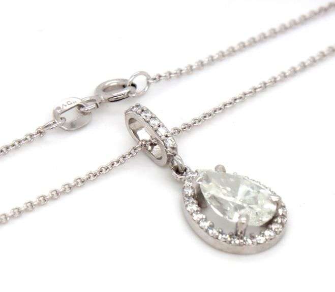 14kt White gold 2ct pear shaped diamond in 1/4ctw halo pendant on chain