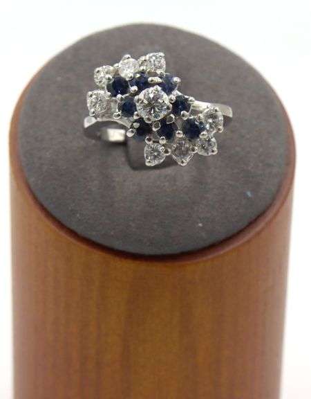 14kt White gold 1.15ctw diamond and blue sapphire cluster ring