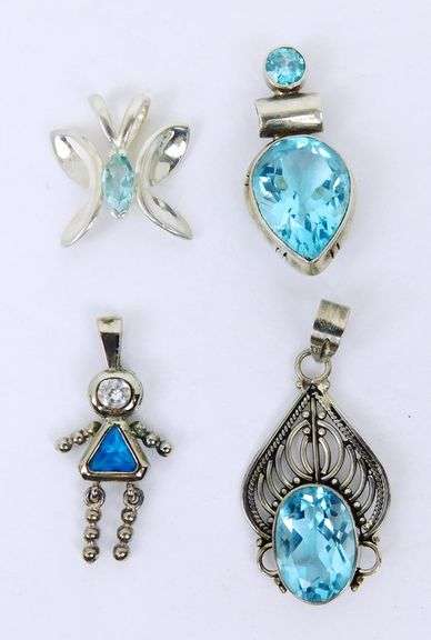4 Sterling Silver Pendants with Blue Stones