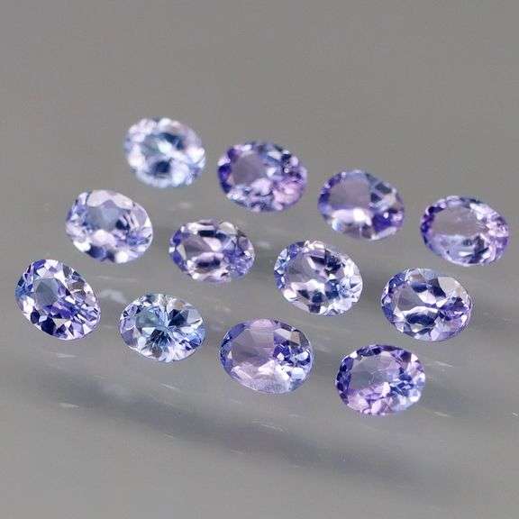 Heavy flashing 2.06ct oval cut Tanzanite set