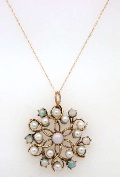14kt Yellow gold opal and pearl knot pendant on chain