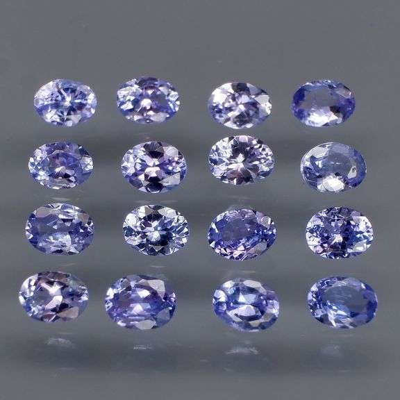 Heavy flashing 2.85ct oval cut Tanzanite set