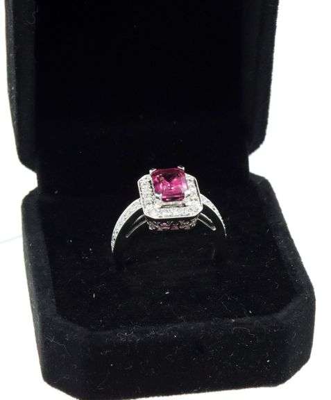 14kt White gold 1.65ct emerald cut tourmaline and diamond halo ring