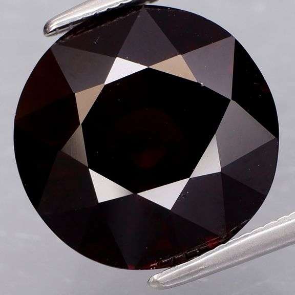 This 9.09ct Mozambique Garnet solitaire is HUGE!!!