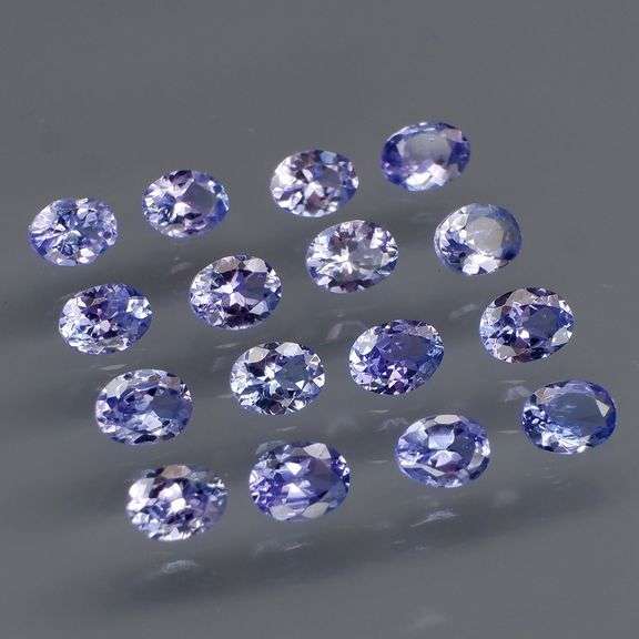 Heavy flashing 2.85ct oval cut Tanzanite set