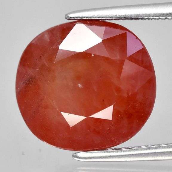 Unique 5.22ct Padparadscha colored reddish orange Sapphire