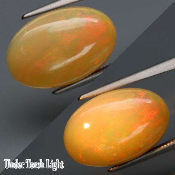 Impressive 6.02ct neon flashing semi-black Opal