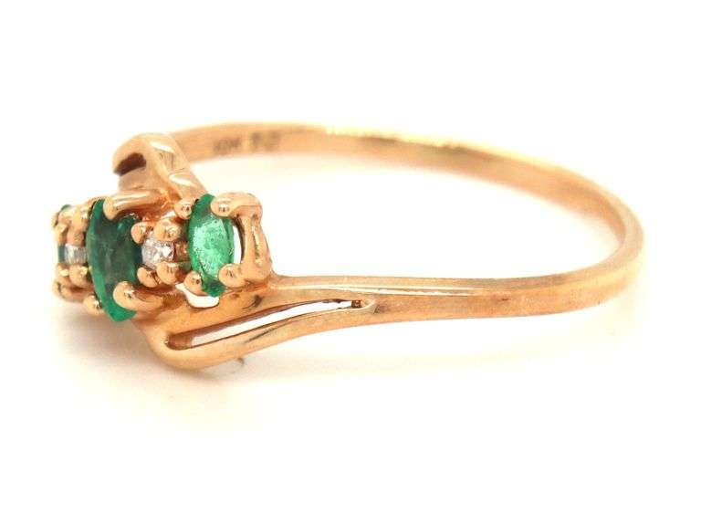 10kt Yellow gold emerald and diamond ring