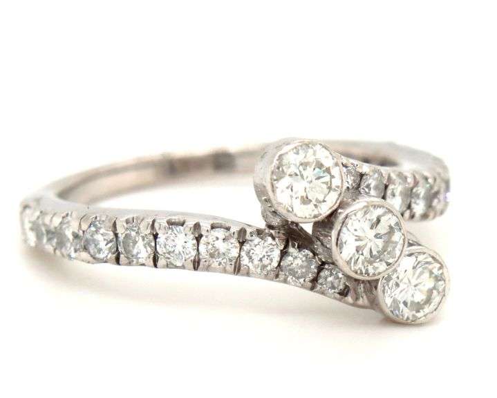 14kt White gold 1ctw 3 diamond bypass ring