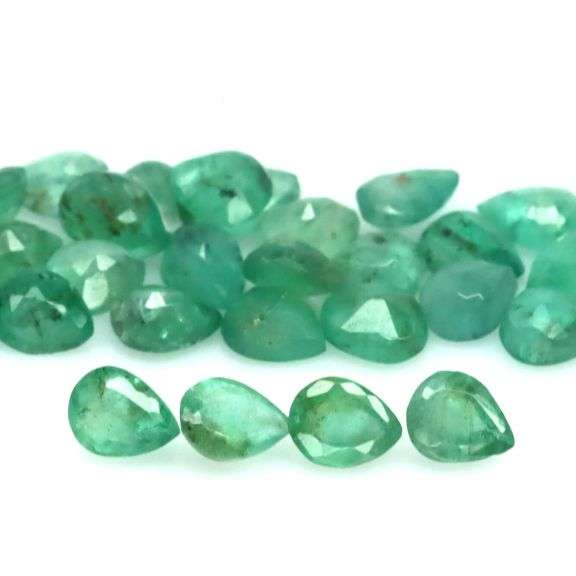 Bright emerald green 7.13ct 33pc Emerald set