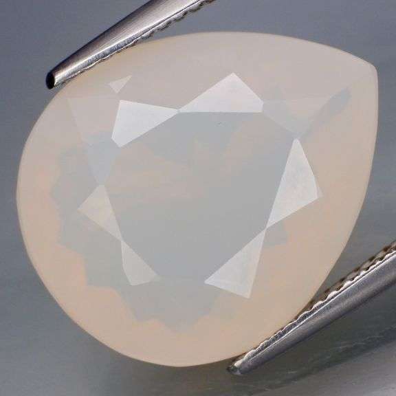 Glowing 10.22ct snow white Fire Opal!