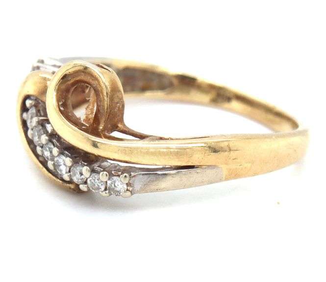 10kt Yellow gold diamond cross over ring