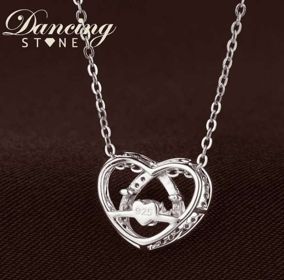 Beautiful heart shape center dancing stone pendant