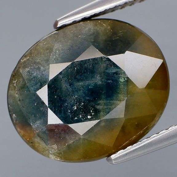 Multi-color! Silver sheen! 14.52ct one of a kind Sapphire!