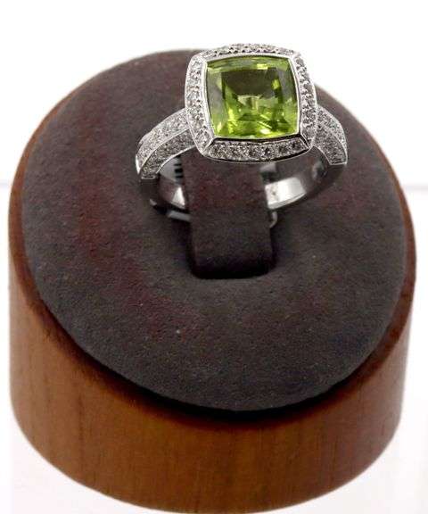 18kt White gold 3.14ct Peridot with 0.66ctw pave diamond halo and shank