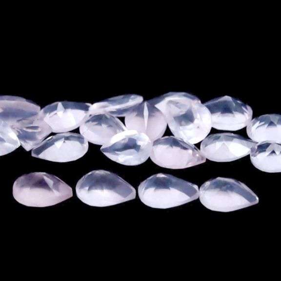 Glowing! 13.12ct powder pink Rose Quartz set