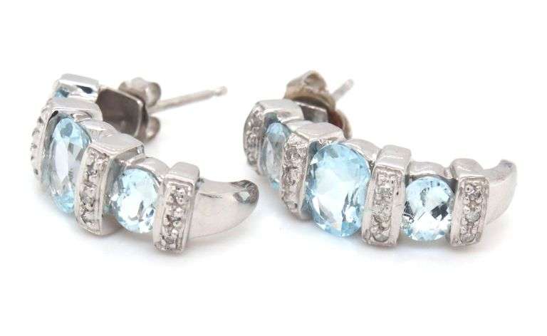 14kt White gold 2.50ctw aquamarine and diamond accent earrings