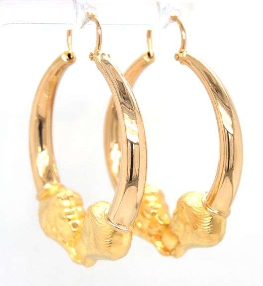 18ktt Yellow gold double lions head hoop earrings