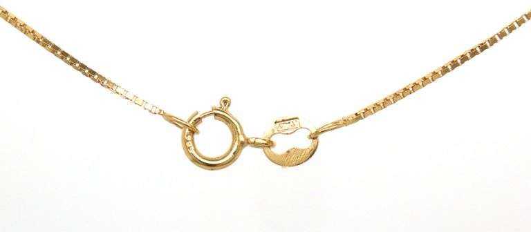 14kt Yellow gold oval Tanzanite and marquise, RBC enhancer pendant on chain