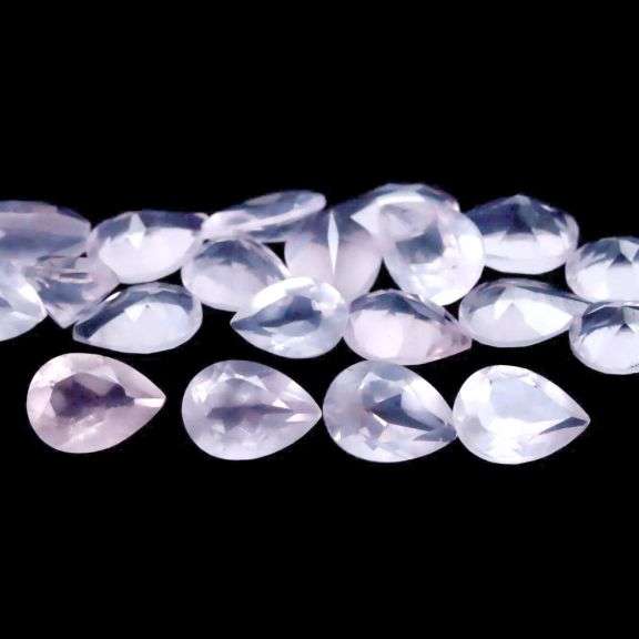 Glowing! 13.12ct powder pink Rose Quartz set