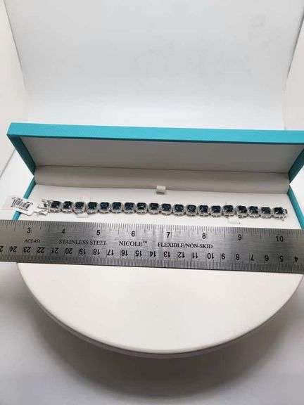 Magnificenrt  22 ctw London blue Topaz and diamond bracelet