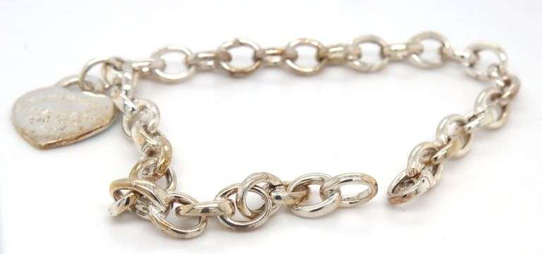 Tiffany & Co oval link bracelet  and enamel heart shaped charm