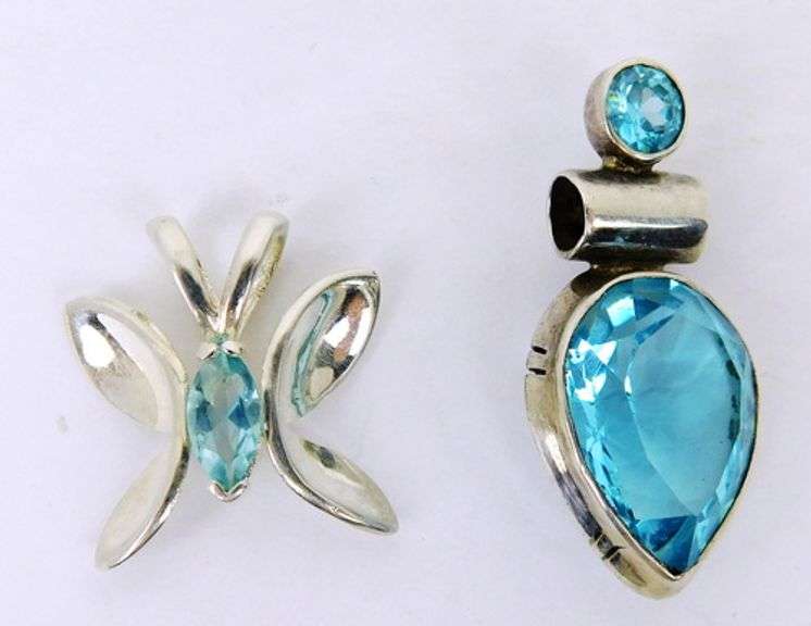 4 Sterling Silver Pendants with Blue Stones